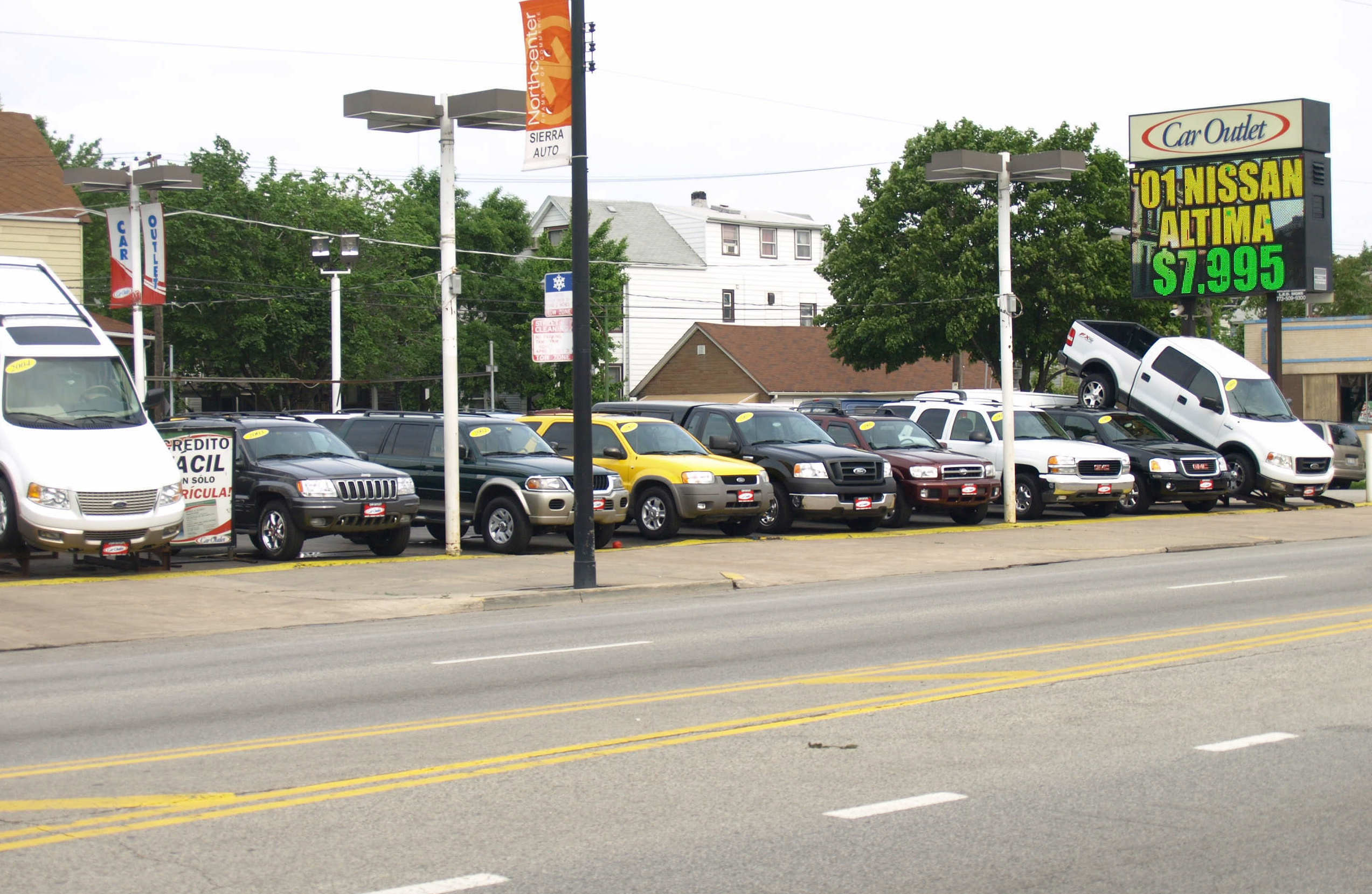 Used Car Lot Sells For 2.94 Million In North Center, Residential