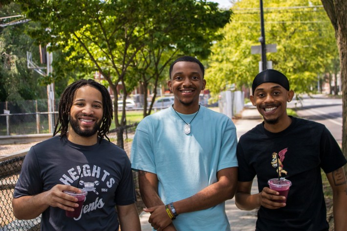 7323 Chicago Café customers pose with their drinks.